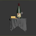 Small Table With Gray Tablecloth Green Wine Bottle Wine Glass And Cheese
