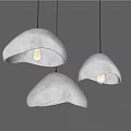 Three Gray Mushroom Shaped Pendant Lights with Soft Light Illuminating from Inside and Soft Material