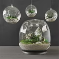 Decorative Ornament Set With Transparent Glass Container Hanging Orbs Stones Green Plants And Sand