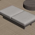 Beige Padded Bench And Round Wooden Coffee Table On Woven Rug