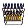 Display Shelf Featuring Neatly Arranged Blue Black And Yellow Bottles On Multiple Layers