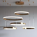 Modern Circular Chandeliers With Golden Frames And Illuminated Rings In Stylish Hanging Design For Interior