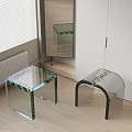 Green Glass Square Stool And Transparent Acrylic Stool With Black Legs In Modern Room Interior