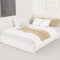 Modern Double Bed with Curved Headboard Decorative Pillows Brown Blanket and Striped Wall