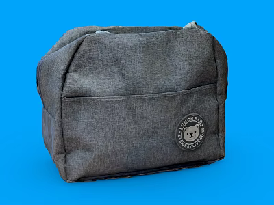 Gray Canvas Bag with Front Pocket and Round Badge on Blue Background 3d model