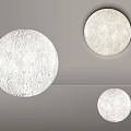 Stylish Circular Wall Lamps With Textured Surface And Soft Lighting Mounted On White Wall 3d model