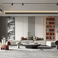 Contemporary Living Room Interior Design With Light Sofa Round Coffee Table Textured Wall And Bookshelf