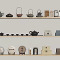 Elegant Tea Ware Display On Wooden Shelves With Teapots Teacups Tea Cakes And Jars