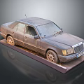Old Rusty Car Display Model On Platform With Weathered Body And Wheels