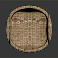 Little Animal Resting In Woven Basket With Two Curved Handles