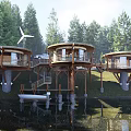 Circular Wooden Cabins on Waterfront Surrounded by Forest and Wind Turbine