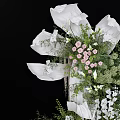 Elegant Floral Installation With White Roses Pink Blooms And Green Foliage