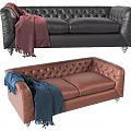 Classic Tufted Black and Brown Leather Sofas with Red and Blue Throws 3d model