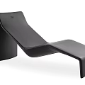 Black Leather Lounge Chair with Modern Sleek Curved Design and Comfortable Shape