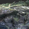 Natural Moss Covered Stone Rocks With Green Vegetation And Water Elements