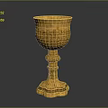 Elegant Golden Goblet With Intricate Carved Patterns And Sturdy Base Design