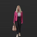 Blonde woman wearing pink blazer white top striped pants holding beige handbag against gray background