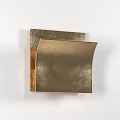 Modern Brass Wall Lamp Mounted On White Wall With Warm Light And Sleek Design