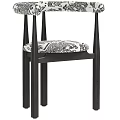 Modern Minimalist Single Chair With Dark Wooden Frame And Black White Patterned Cushion