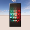 Black Vertical Structure With Colorful Triangles And Circular Shapes Against Blue Sky With Clouds