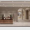 Modern Clothing Store Interior Design With Display Racks Mannequins Sofa And Lighting 3d model