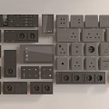 Modern Black and Gray Switch Panels with Various Sockets and Sleek Designs