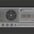 Vintage Cassette Recorder Design With Light Gray Body Speaker Grille And Control Buttons