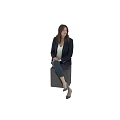 Professional Woman In Navy Blazer White Top And Blue Jeans Sitting On Black Cube