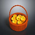 Fresh yellow apples in an orange woven basket filled with ripe fruits