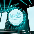 Modern Tech Stage With Circular Screen Green Lighting Effects Stepped Platform And Person Standing Center