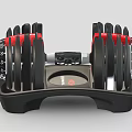 Adjustable Black Fitness Dumbbell Featuring Red Accents And Weight Plates On Stand