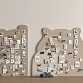 Bear Shaped Corkboards Covered With Various Photos And Small Cards With Small Decor Items Nearby