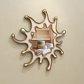Decorative Mirror on Beige Wall with Irregular Sunburst Shaped Frame Reflecting Bedroom With Furniture