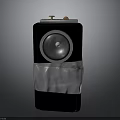 Portable Bluetooth Speaker With Round Speaker Black Body Silver Accent And Gold Knobs