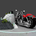 Black Motorcycle With Red Seat Near Rocks And Green Plants With Blue Halo