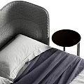 Modern Upholstered Double Bed with Quilted Gray Headboard White Pillows and Wooden Legs