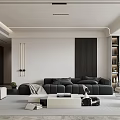 Modern Living Room Interior Design With Black Sofa White Coffee Table Green Plant And Bookshelf