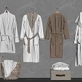 Different Colored Bath Robes Hanging On Gray Wall With Wicker Basket And Storage Box