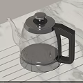 Stylish Transparent Glass Teapot Featuring Stainless Steel Lid And Black Handle On Marble Countertop