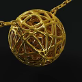 Delicate Gold Necklace With Netted Sphere Pendant And Red Gemstone Center