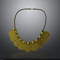 Golden Scallop Shaped Necklace With Small Beads And Brown Leather Cord