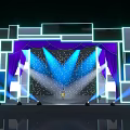 Contemporary Stage Design Featuring Purple Curtains Blue Lighting Geometric Decorations Spotlights And Standing Central Person