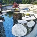 Modern Garden Ornament Design with Wavy Green Lawn Water Feature and Stone Pathway