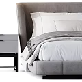Modern Double Bed With Upholstered Headboard White Linens And Nightstand