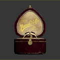Open Red Velvet Jewelry Box With Ring And Gold Lettering Clothing Accessory