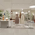 Modern Minimalist Clothing Store Interior With Mannequins Dresses Plants And Decorative Items