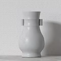 White Ceramic Vase With Minimalist Modern Design On Light Colored Tabletop Against Textured Wall