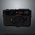 Black Leica Camera With Vintage Design Classic Lens And Red Logo