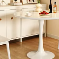 White Round Dining Table with Chairs Vase Flowers Bottles Strawberries Coffee Cup and Book
