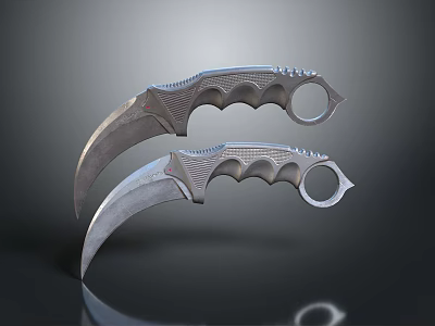 Two Metal Karambit Knives With Curved Blades And Finger Hole Handles 3d model